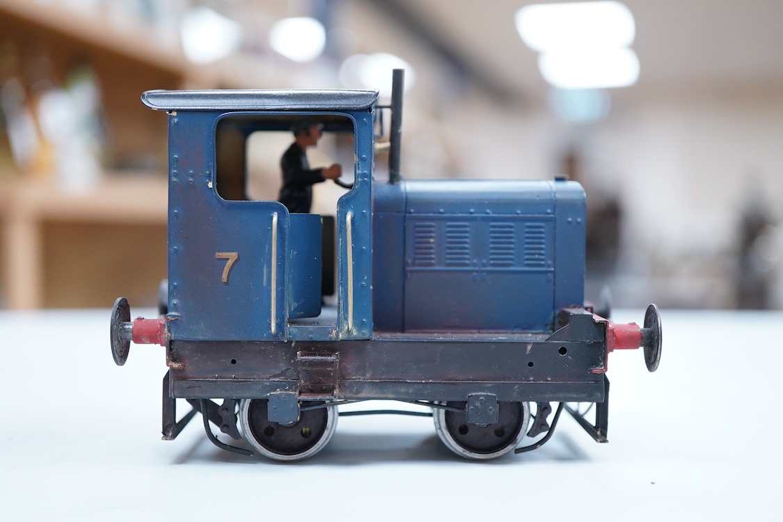 A narrow gauge scratch built model railway locomotive running on 32mm track by John Worsley, a Ruston 0-4-0 diesel shunter, 7, a detailed model with sprung buffers, etc. and fitted with a Mashima 12v dc motor, for two ra